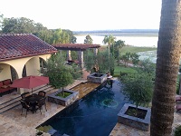 tuscan infinity swimming pool stone tile design with spa below