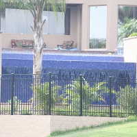 swimmig pool with water fall sheer shelf in windermere florida